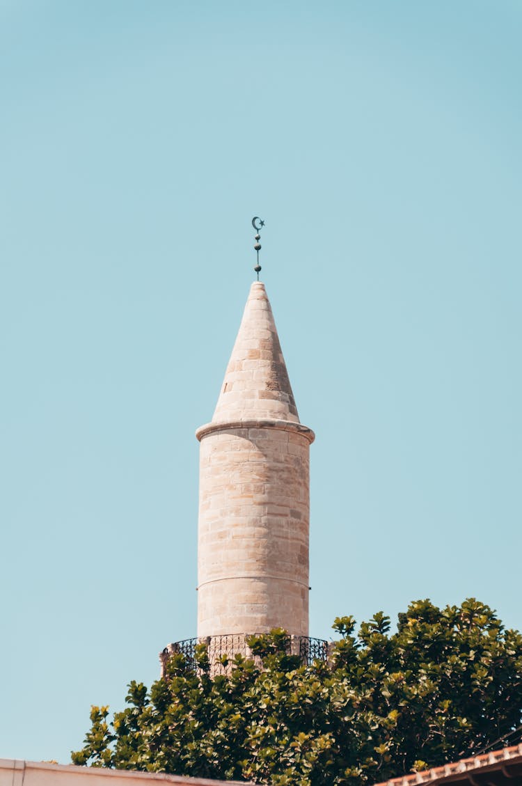 Ancient Castle Tower Against Blue Sky