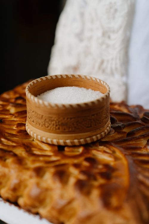 Free Close-up of traditional Russian bread and salt, symbolizing hospitality and cultural tradition. Stock Photo
