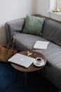 Macbook Pro on Brown Wooden Table