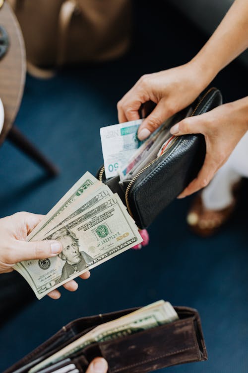 Free People Exchanging Money Stock Photo