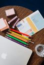 White Printer Paper Beside Pencils and Pink Box