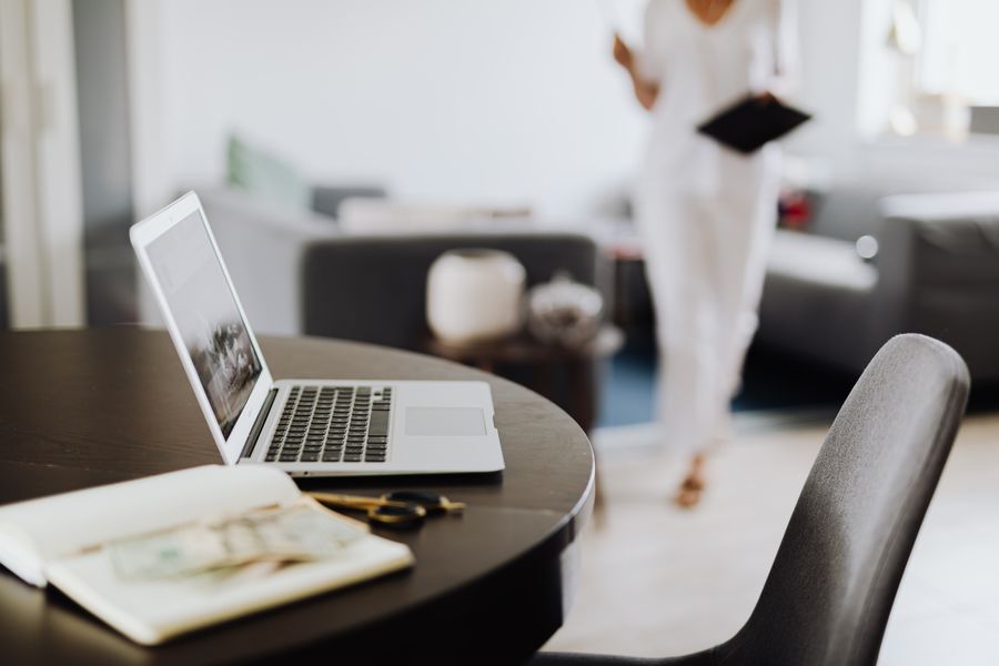 Designer's desk with keyboard and notes