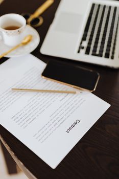 A professional reviewing a contract regarding South African music royalties.