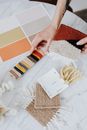 Person Holding White and Brown Paper