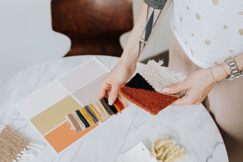 Fabric and colour samples laid out on a design table
