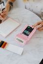 White and Pink Digital Device