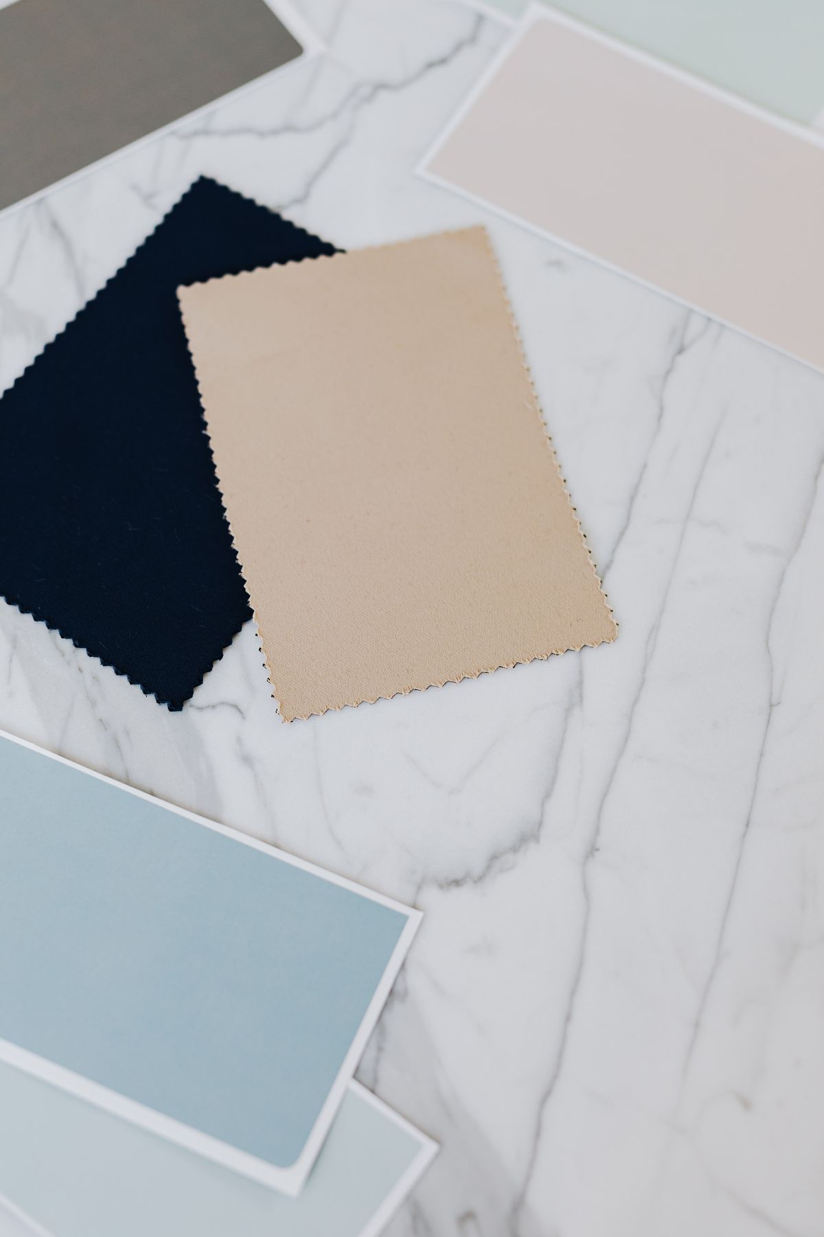 Beige paint colour swatches with complementary neutral tones