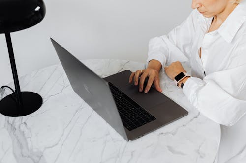 High Angle View of Woman Using Laptop