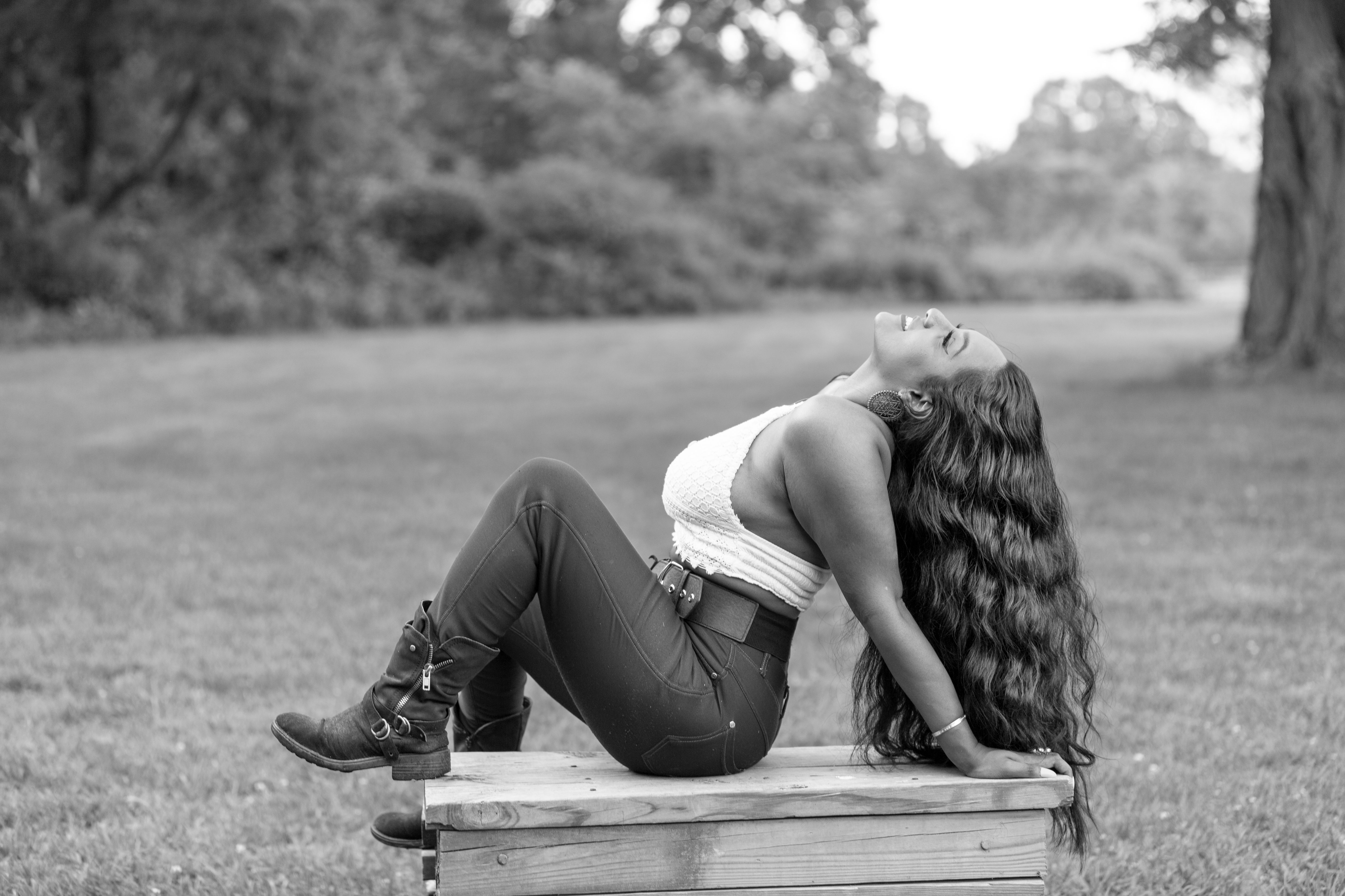 Relaxed Woman in Outdoor Park Setting · Free Stock Photo