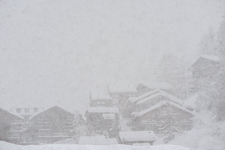 Rural Snowy Village During Severe Blizzard