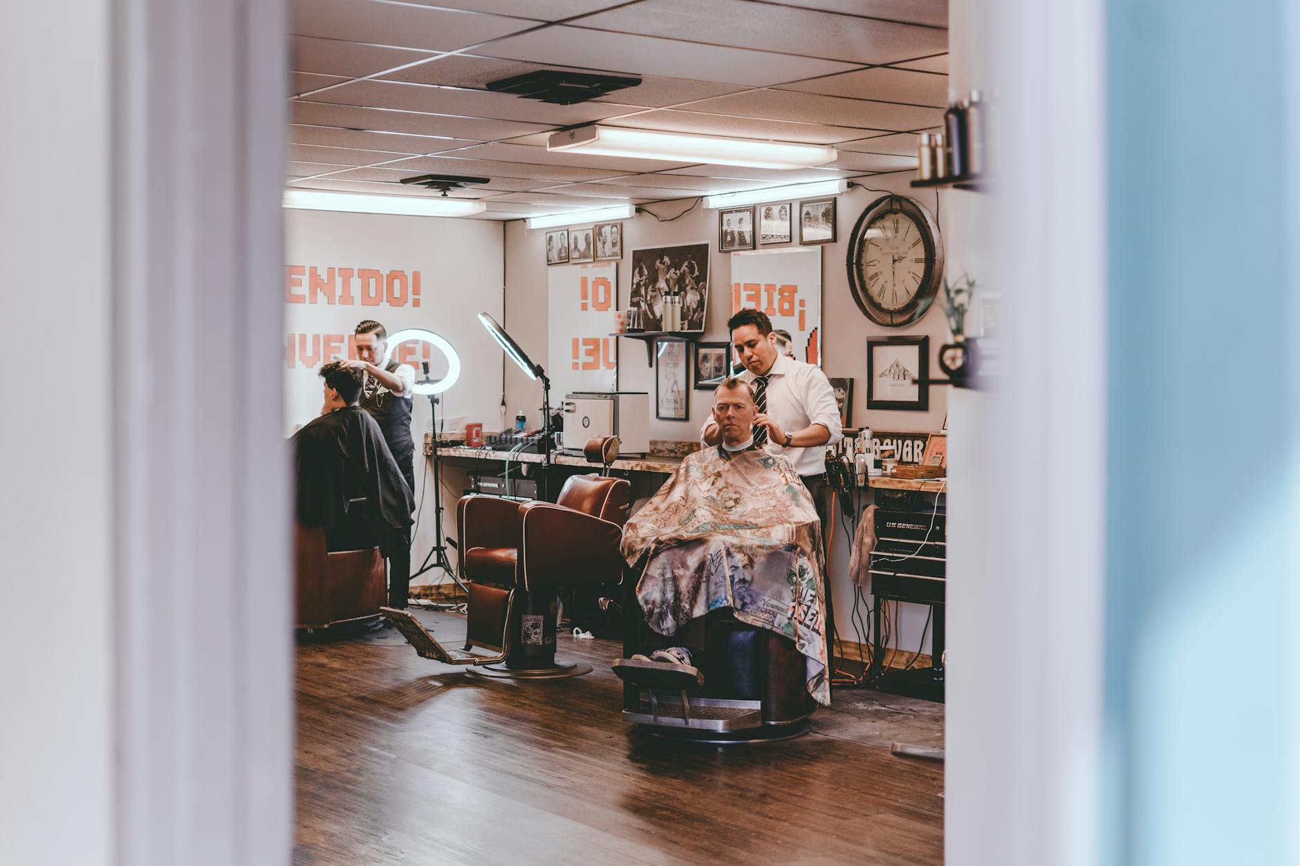 masters-and-customers-in-traditional-barbershop-free-stock-photo