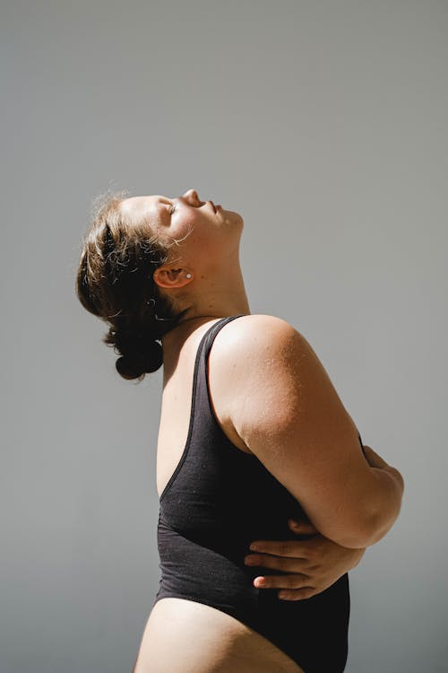 Woman Looking Up Towards the Sky