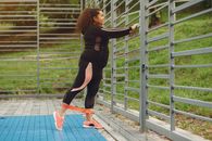A Woman Exercising with an Elastic Band
