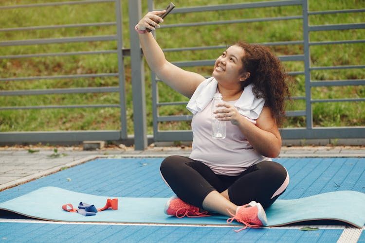 Woman Taking Selfie After Workout