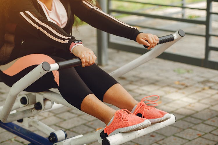 Woman Working Out In Outdoor Gym