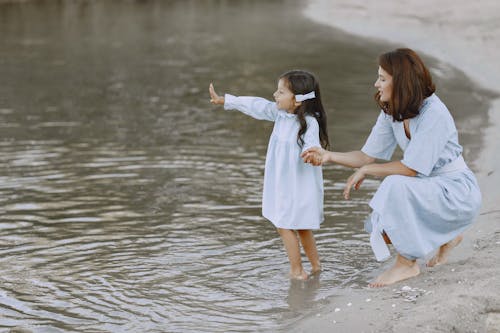Mother and Daughter on Lake Shore