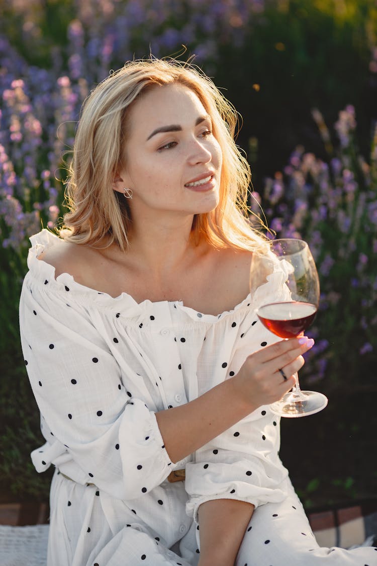 Happy Beautiful Woman Drinking Wine Outdoors