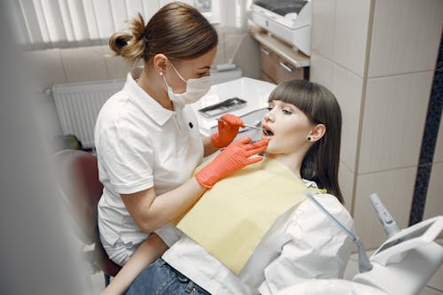 Beautiful Woman During Dentist Procedure