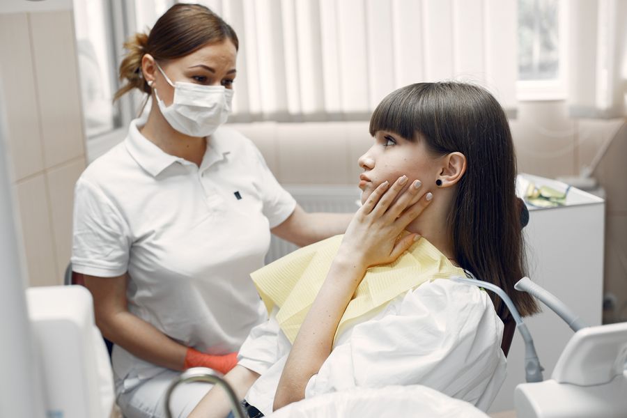 Patient receiving care for tooth pain