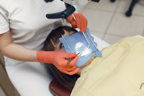Free A Patient Getting a Dental Treatment Stock Photo