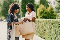 Women with Bags Talking
