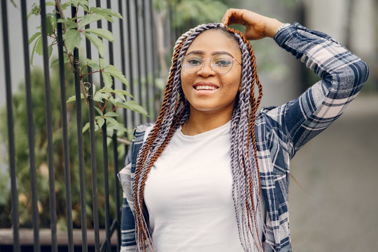 Portrait Of Woman With Colorful Braids