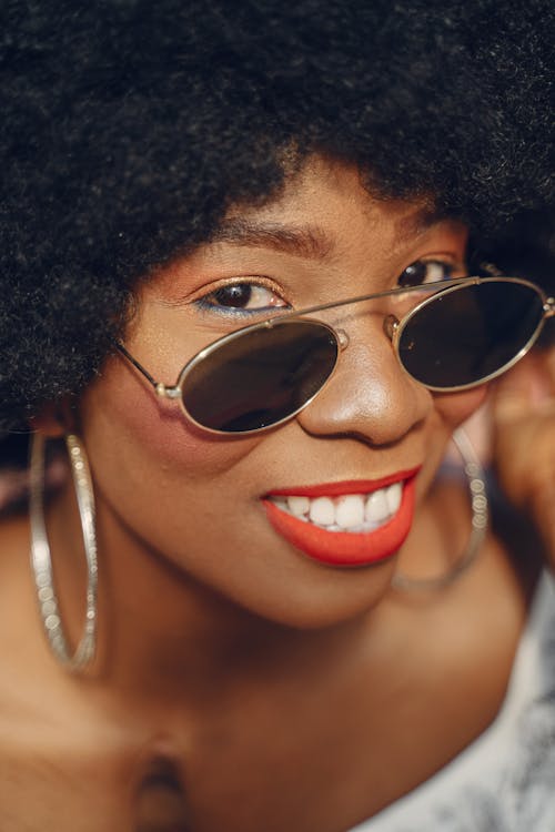 Free Close-Up Shot of a Woman Wearing Sunglasses  Stock Photo