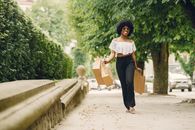 Smiling Woman with Bags