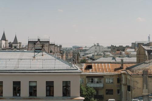 Free Explore a timeless skyline blending vintage rooftops and historic charm, capturing the essence of urban architecture. Stock Photo