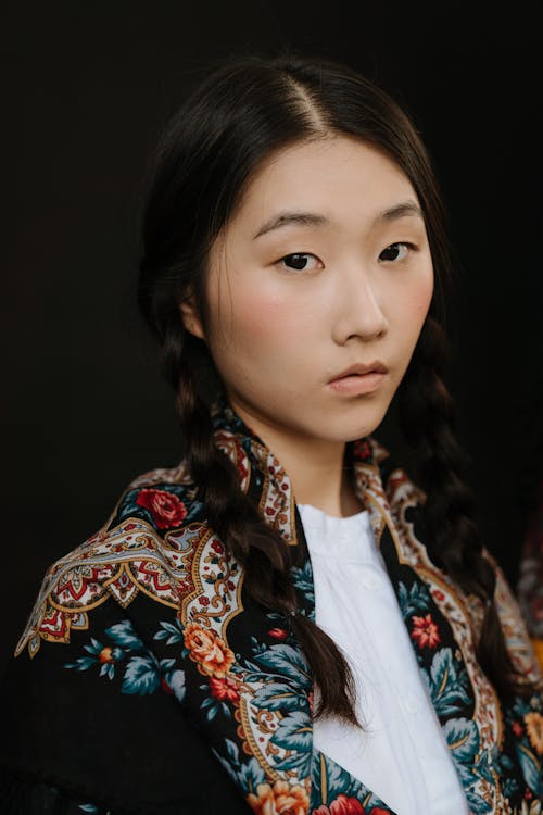 Woman in White Blue and Brown Floral Shirt