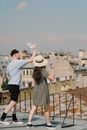 Man and Woman Standing on Balcony