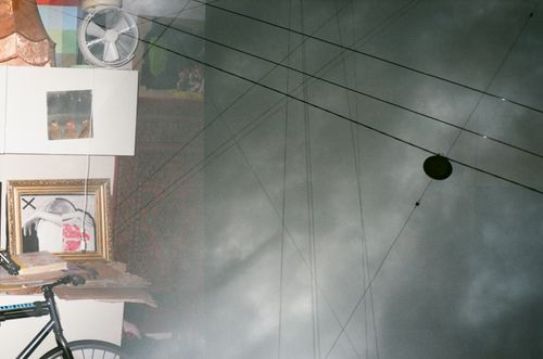 Free Abstract indoor scene with reflections, wires, and framed artwork creating a unique double exposure look. Stock Photo