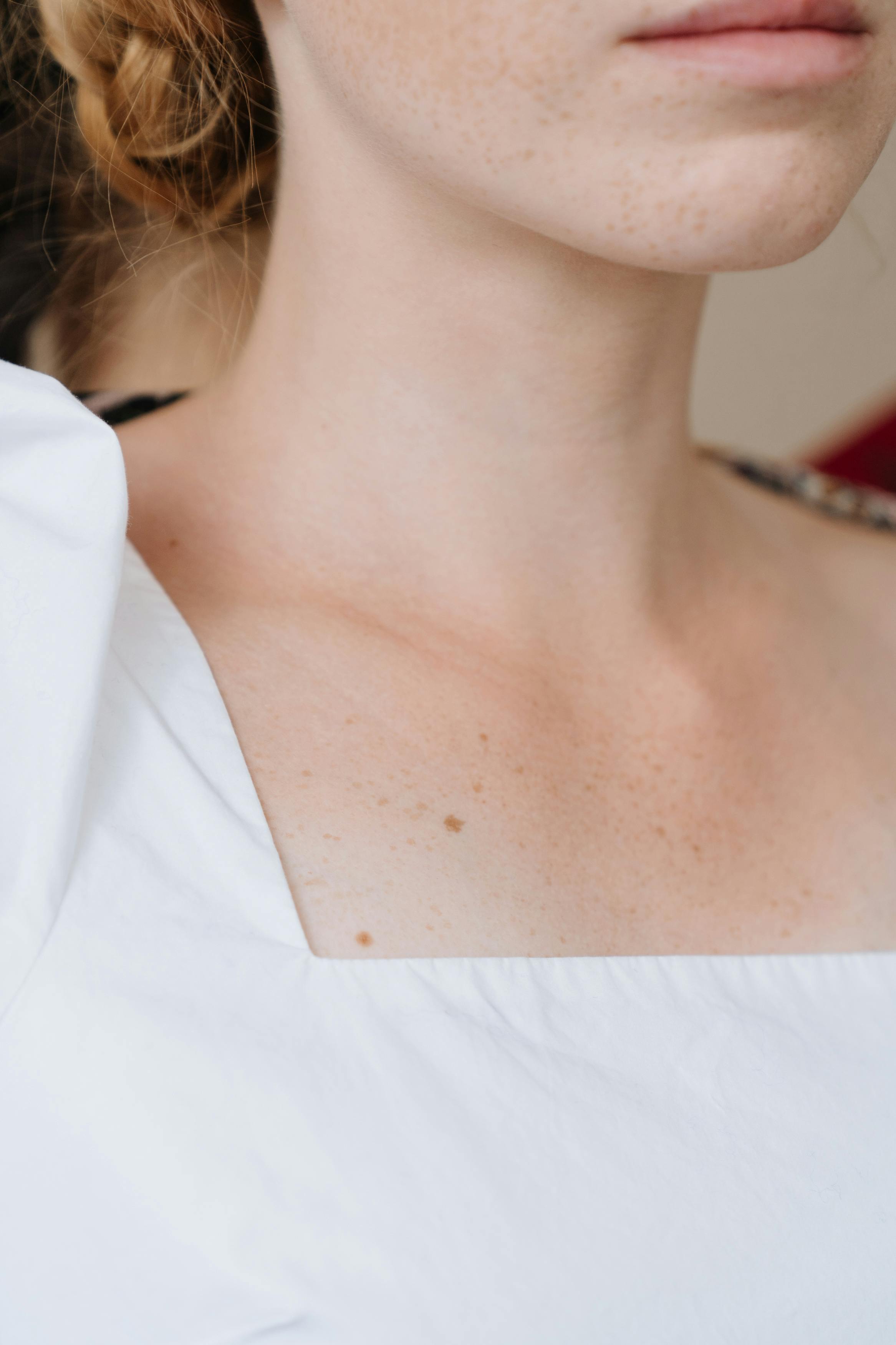 woman in white v neck shirt