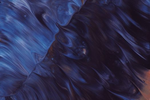 A mesmerizing abstract swirl of blue paint creating a stunning artistic background.