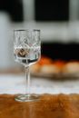 Clear Wine Glass on White Sand