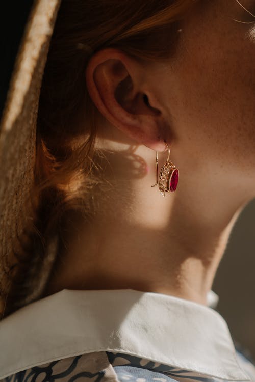 Woman Wearing Silver Diamond Stud Earring