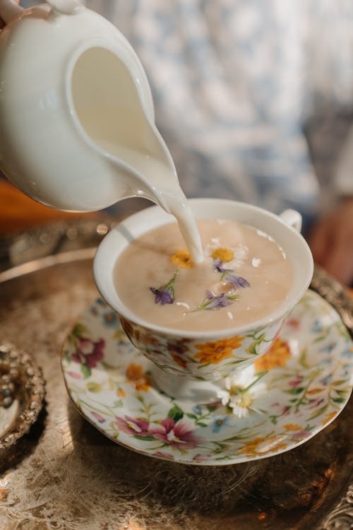 White Green and Pink Floral Ceramic Teacup With White Spoon