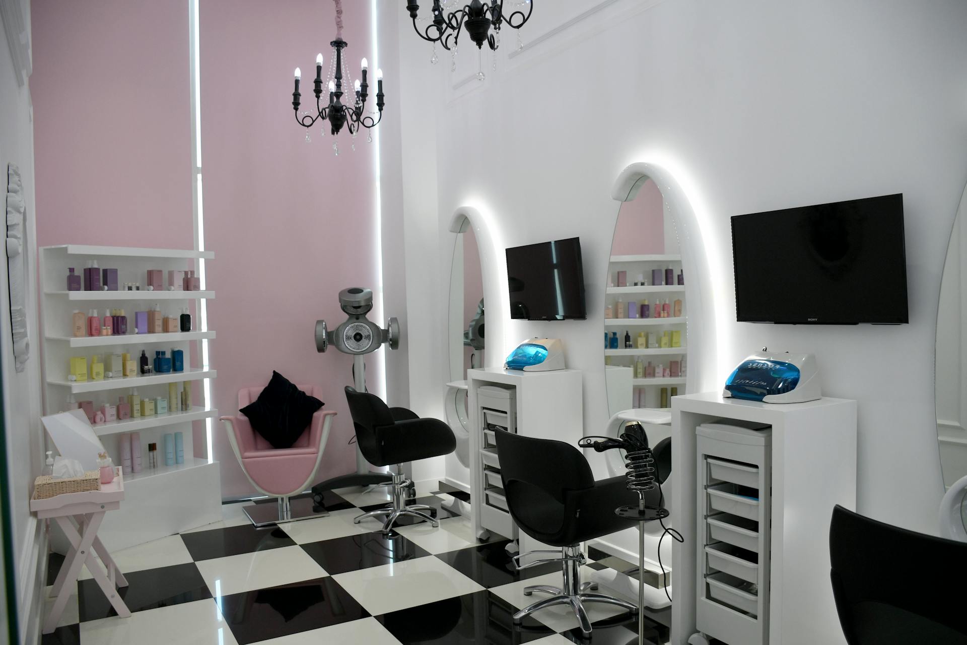 Stylish beauty salon with chic interiors, mirrors, and equipment in Abu Dhabi.