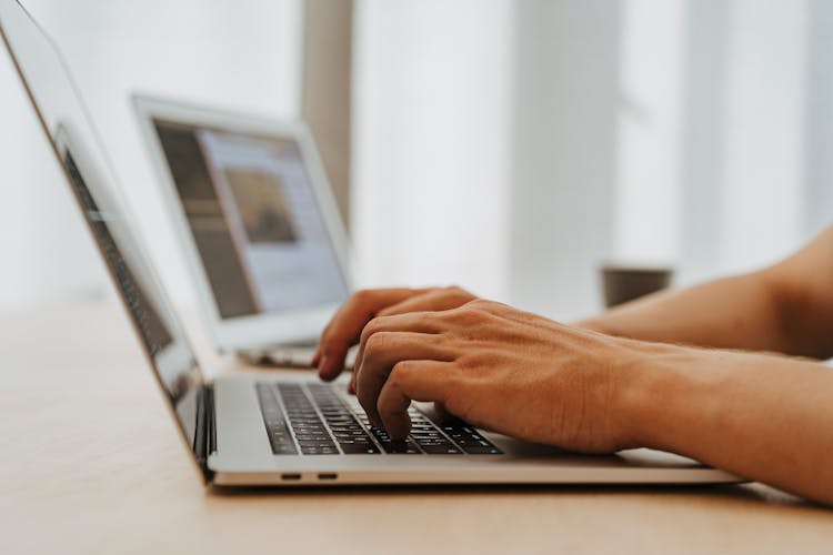 Person Using A Macbook Air