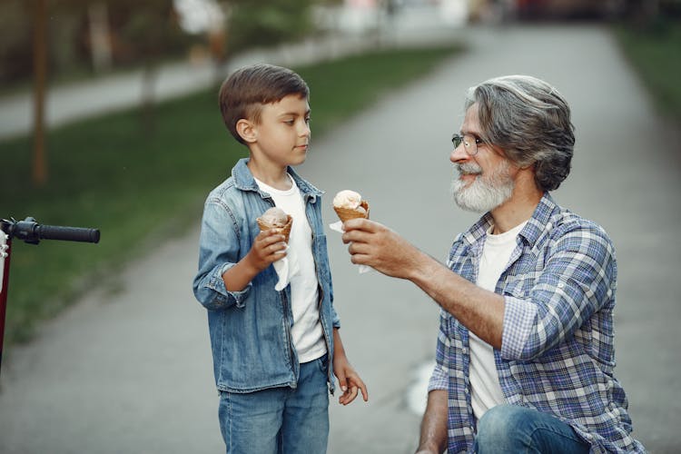 Man And Boy Eating Ice Cream