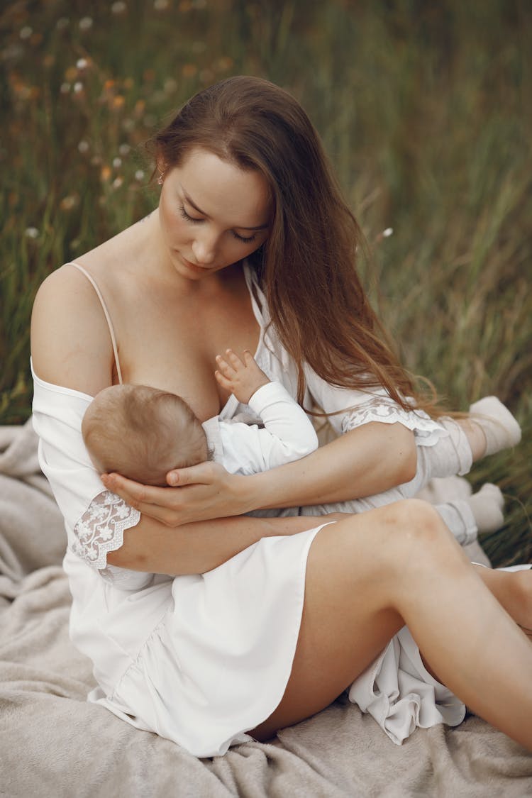 Woman Breastfeeding Her Baby 