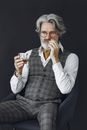 Man in Gray Dress Shirt Wearing Eyeglasses