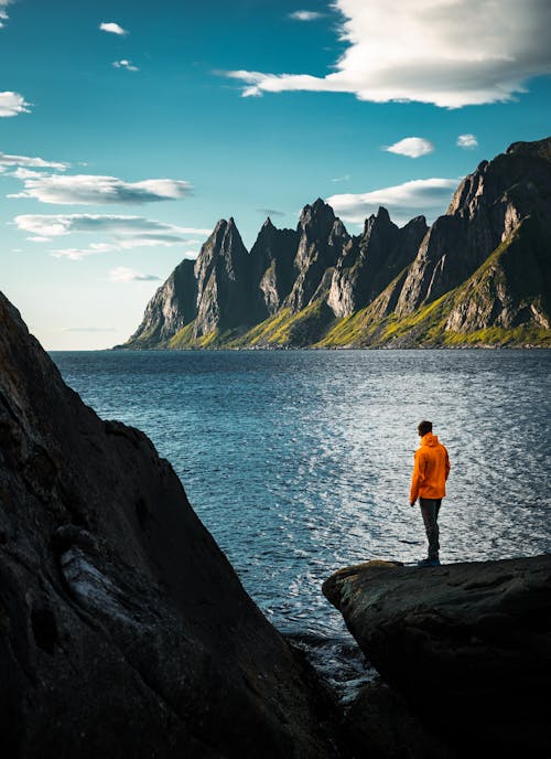 A Person Looking at Oksehornan in Tungeneset