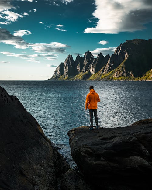 A Person Looking at Oksehornan in Tungeneset