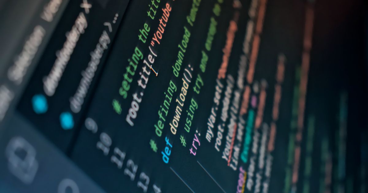 Detailed view of computer code highlighting syntax in colors on a screen.
