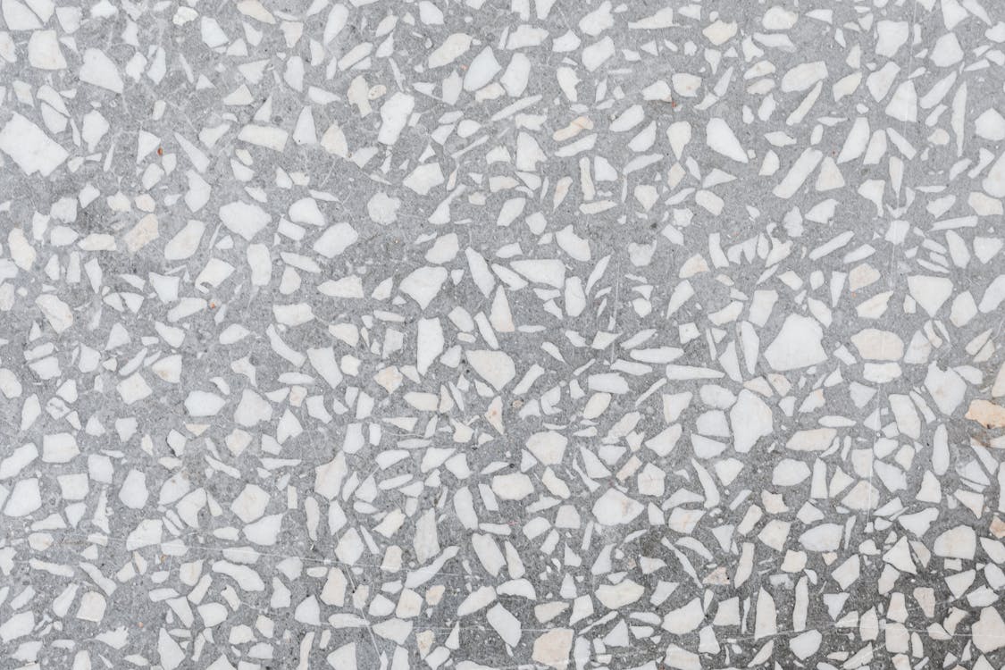 Free High-resolution image of a classic terrazzo stone texture with white and gray patterns. Stock Photo