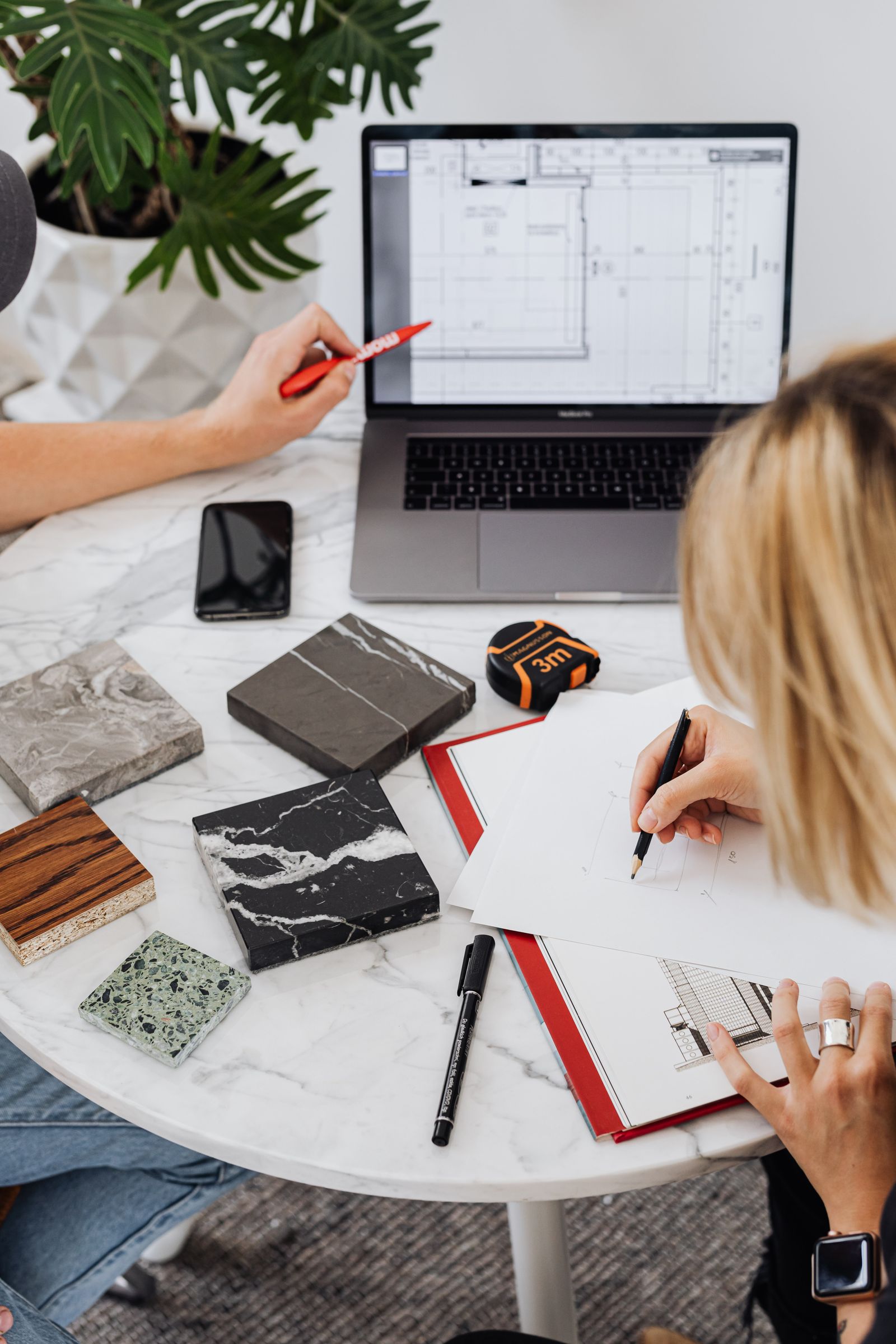 Designers collaborating on a creative project