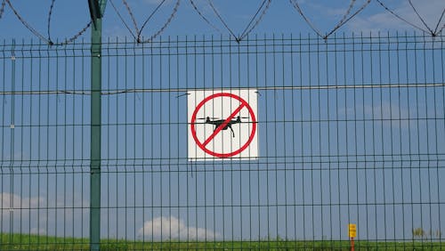 Free Signage on a Metal Fence Stock Photo