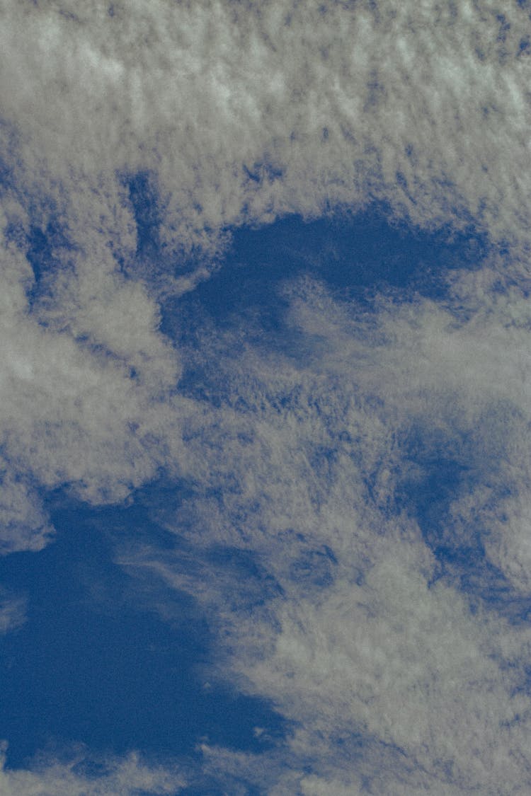 Cirrus Clouds Against Blue Sky