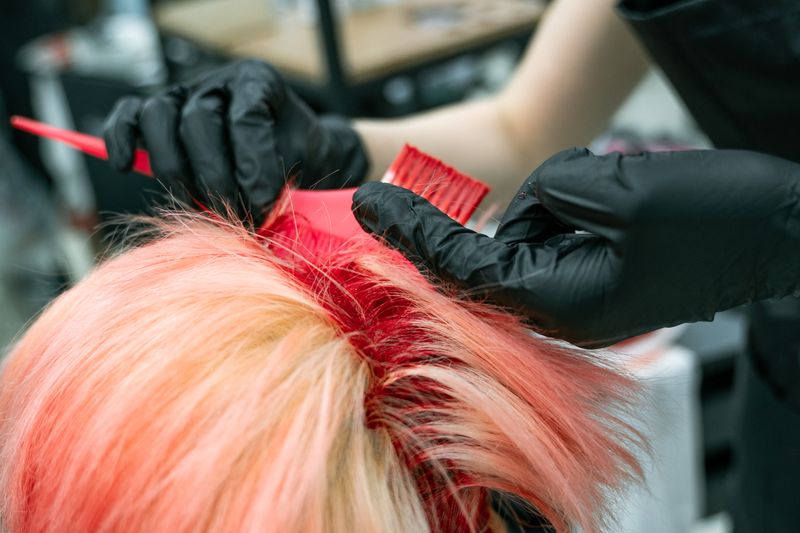 Close-up of hair color being applied in the salon